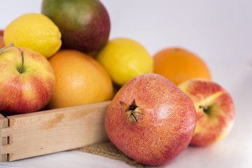 Fototapeta na wymiar Food, citrus, lemon, orange, pomegranate, mango, apples, fruit, decor, objects