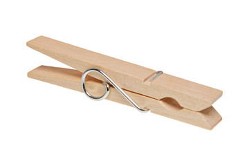 Wooden clothes peg on a white background