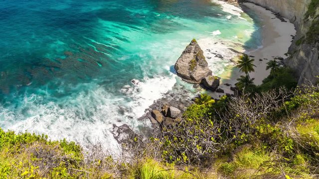 Timelapse View from the cliff to Hidden white Atuh Beach at Nusa Penida island, Bali, Indonesia