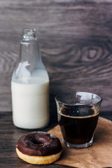 Donuts and milk in a botlle
