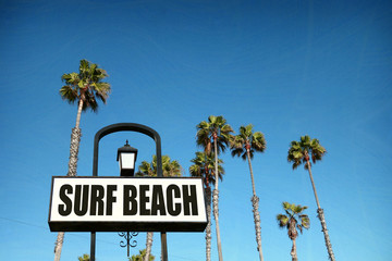 Naklejka premium aged and worn surf beach sign