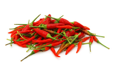 Red chilli peppers isolated against a white background