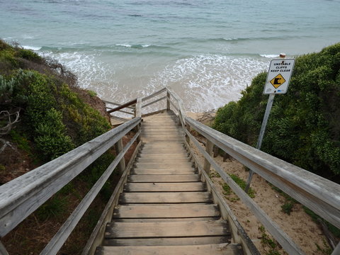 Long wood stairway to the beach along a cliff , raw image set taken in Jan Juc Beach, Victoria, Australia 20117.