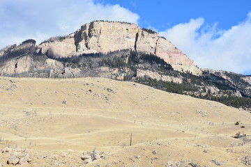 Rising range to peaks with blue skies