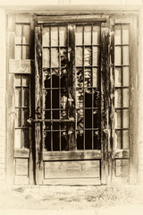 Naklejka premium damaged old door