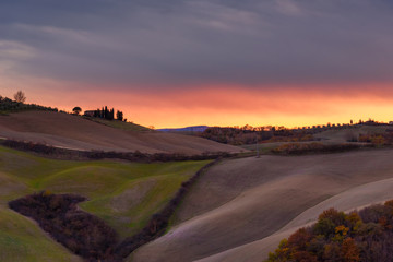 Idyllic and colorful tuscan countryside in autumn