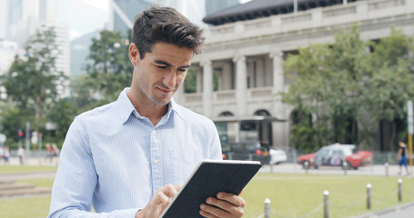 Man use of tablet at outdoor