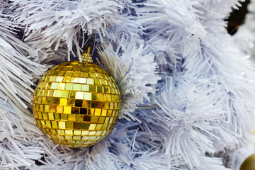 Beautiful decorated christmas tree with gold bauble