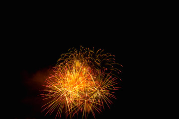 Fototapeta premium Fireworks light on the sky in beautiful night with dazzling display of celebration day