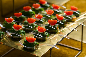 a buffet spoon with delicacies