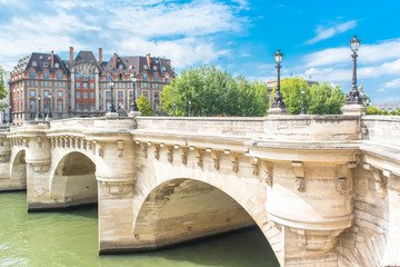 Obraz premium Paris, panorama of the Pont-Neuf, with typical buildings in background quai de Conti 