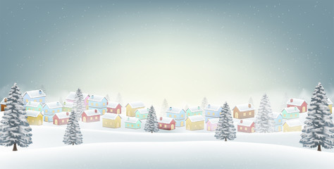 small village in snow winter hill background