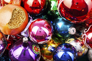 Christmas bauble vintage glass ball ornaments. Blue yellow,red,green,pink,orange,gold, shiny reflective mirrored glass balls. Colorful christmas wallpaper.