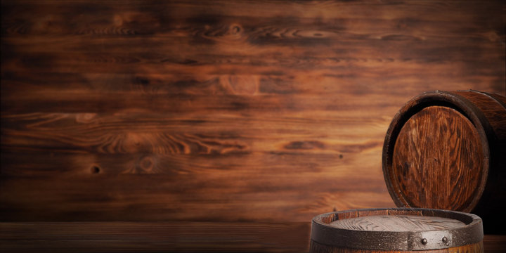 Rustic wooden barrel on a night background