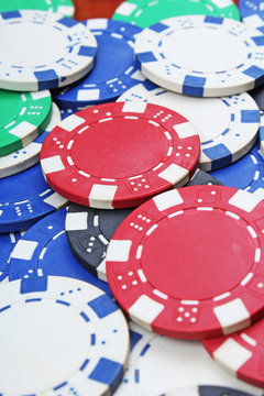 Casino poker money chips texture. Stack of poker chips as background. Poker casino token tokens as background. Poker money.