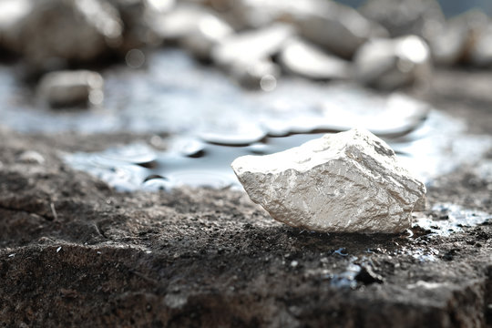 Lump Of Silver Or Platinum On A Stone Floor