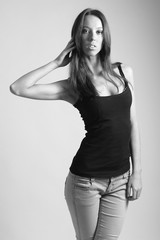 young fashionable girl posing in clothes