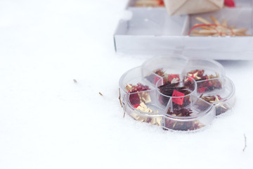 christmas decorations in red and gold colors on white background with empty copy space for text. holiday and celebration concept for postcard or invitation.