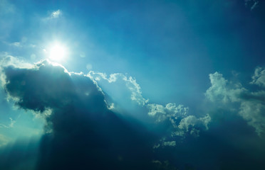 Blurred blue sky with ray light