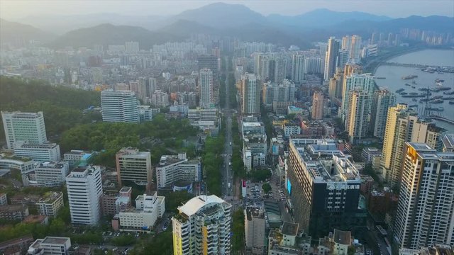 sunset time zhuhai cityscape traffic street bay port aerial panorama 4k china
