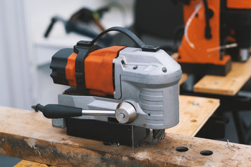 Industrial tool for work in a woodshop - machine saw