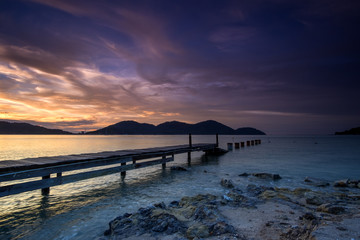 Fototapeta na wymiar Beautiful view of sunset at Lumut,Perak,Malaysia. soft focus, blur due to long exposure. Visible noise due to high ISO.