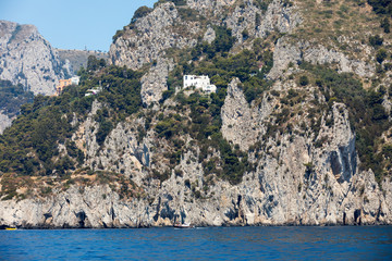 View from the boat on the cliff coast of Capri Island