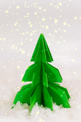 miniature paper pine tree figure, selective focus
