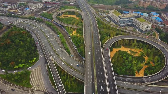 wuhan cityscape day time traffic road junction aerial panorama 4k china

