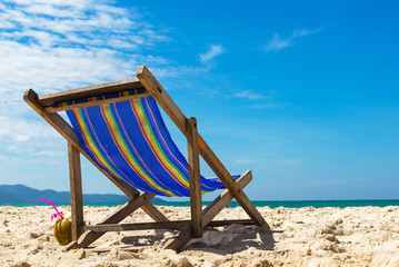 Beach chair on the beach,White sand beach , Sea and Blue Sky With Beach Chair. Maiton , Thailand.