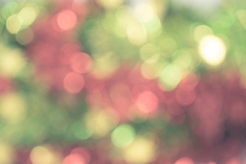 Abstract blur image of Christmas illumination with bokeh for background usage. (vintage).