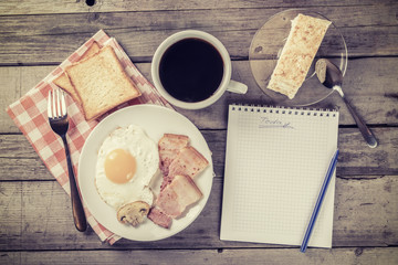 Thinking of my plans at breakfast, vintage photo