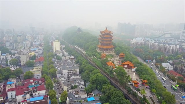 day time wuhan city slum living block yellow crane tample aerial panorama 4k china
