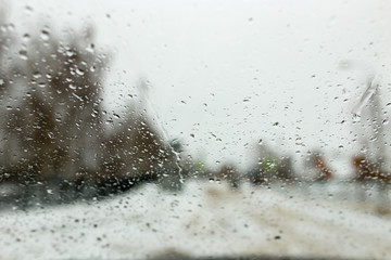 Drops on the car window in winter