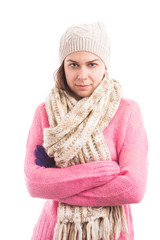 Young woman wearing knitted warm clothes with arms crossed