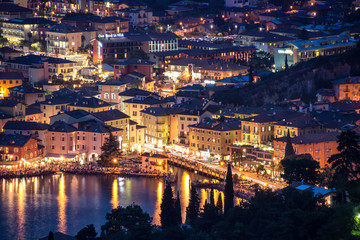 Torbole,Lago di Garda ,Italy - 07 JULY 2014:Panorama of Torbole and Garda lake by night , a small town on Lake Garda, Italy. Europa