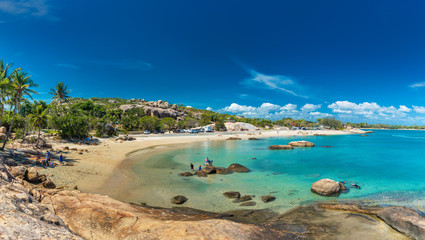 BOWEN, AUS - SEP 18 2017: Horseshoe Bay at Bowen - iconic beach with palm trees, Queensland, Australia © Martin Valigursky