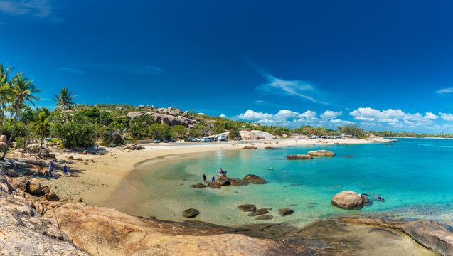 BOWEN, AUS - SEP 18 2017: Horseshoe Bay At Bowen - Iconic Beach With Palm Trees, Queensland, Australia