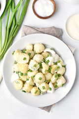 Healthy potato salad with eggs and green onion