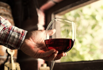 Sommelier tasting a glass of red wine