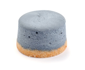 Small round blueberry cheesecake on isolated background