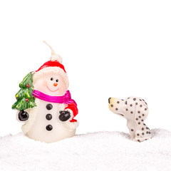 White snowman in the snow