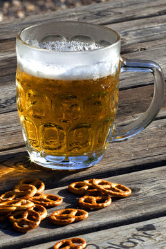 photo of beer mug with salted pretzels