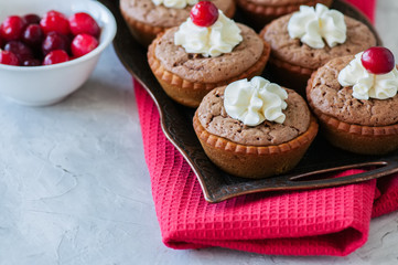 Brownie mins pies on a vintage tray.