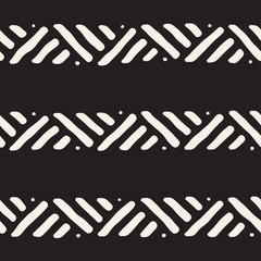 Hand drawn style ethnic seamless pattern. Abstract geometric tiling background in black and white.