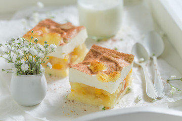 Tasty apple pie with apples and cream
