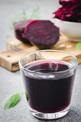 Fresh beetroot apple carrot lemon juice. Selective focus, copy space, close up. 
