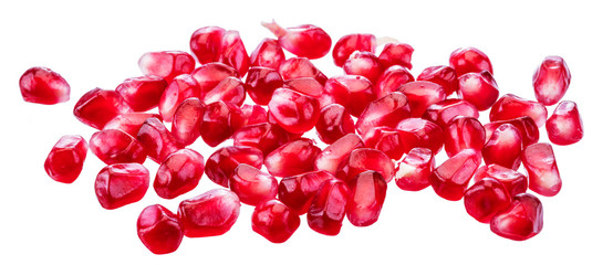 Ripe pomegranate seeds on the white background.