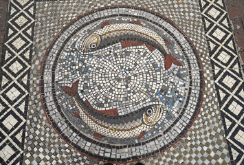 Religious christian mosaic with two fishes 