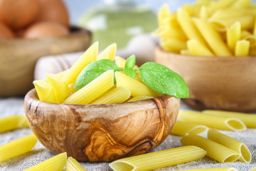 Penne rigate. Macaroni in the form of feathers. mostaccioli pasta.